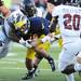 Michigan quarterback Russell Bellomy attempts to move the ball past UMass defensive tackle Hafis Williams in the fourth quarter at Michigan Stadium on Saturday. Melanie Maxwell I AnnArbor.com